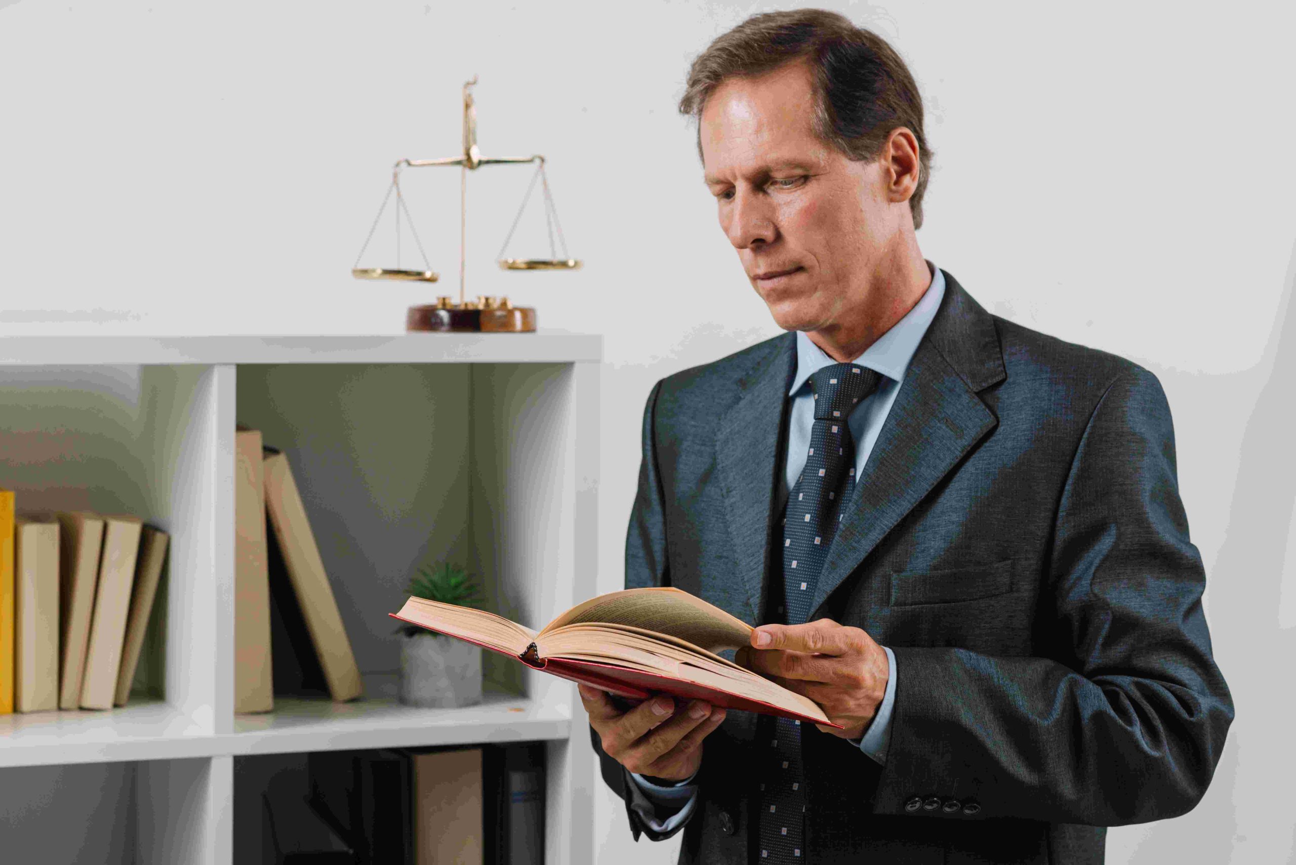 Image by <a href="https://www.freepik.com/free-photo/mature-male-reading-legal-book-courtroom_3134317.htm#query=expert%20law&amp;position=25&amp;from_view=keyword&amp;track=ais&amp;uuid=15526073-537a-4de0-bd7a-9a8b5c3429df">Freepik</a>